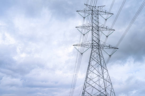 istock Electricity concept. Close up high voltage power lines station. 1165033130