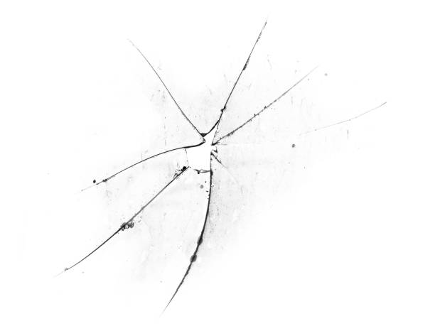 istock Cracks in the glass. Broken glass on a white background, texture background design object 1165035359