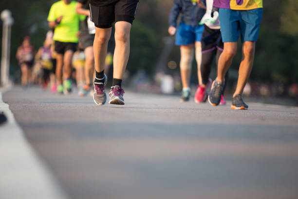 istock Marathon running race, Run up the mountain road. 1165038880