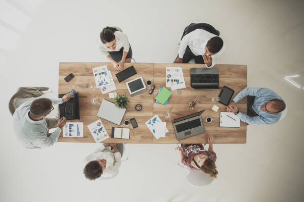 istock Business meeting by multi-ethnic group 1165043477