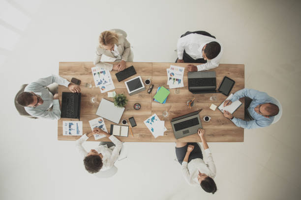 istock Multi-ethnic group on meeting in conference room 1165043579