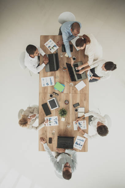 istock Directly above of business people planning next step 1165043584