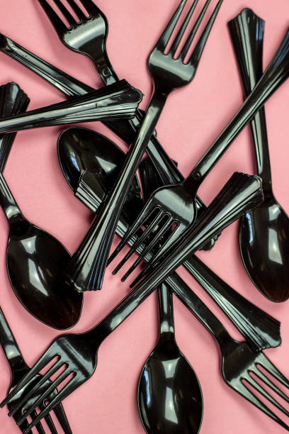istock Forks and spoons on a pink background. Minimal concept. Without plastic. 1165049426