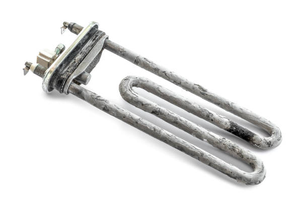 istock broken ten. heating element of the washing machine 1165050720