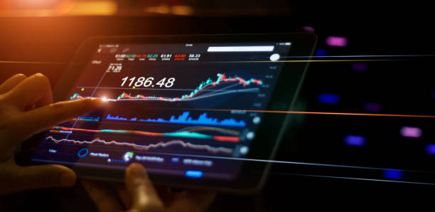 istock A businessman using a tablet mobile device to check and analyzing market data of stock market trends on them.  