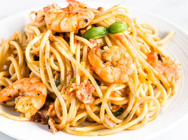 istock Shrimp Spaghetti Pasta on White Background Close-Up Photo. 1165053645