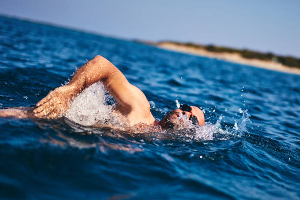 istock Swimmer training on the open sea / ocean. 1165053653