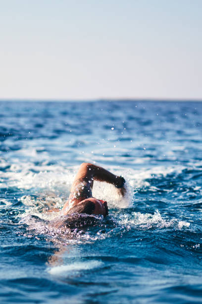 istock Swimmer training on the open sea / ocean. 1165053704