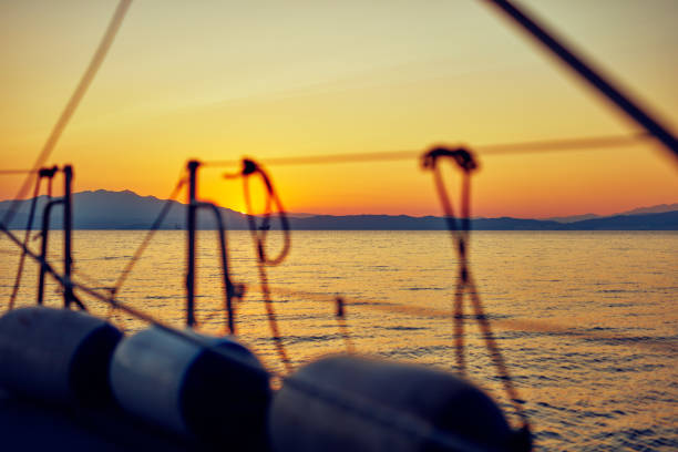 View of a sailing ship front deck and open sea.