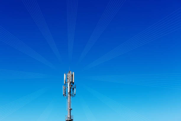 istock Mobile phone base station antenna on a fine summer day 1165060224