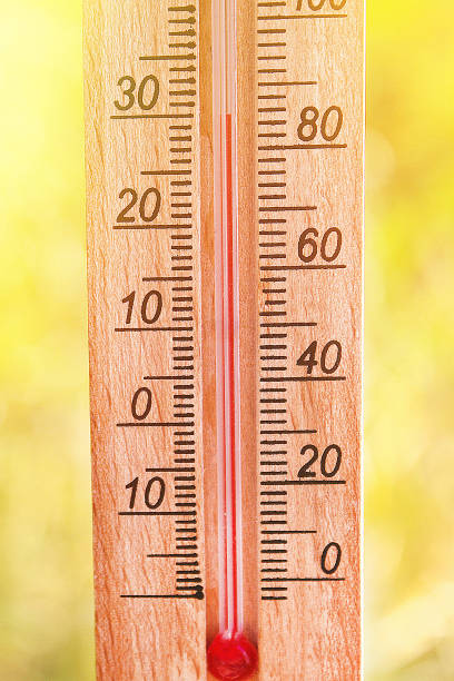 istock Thermometer displaying high 30 degree hot temperatures in sun summer day. 1165061547