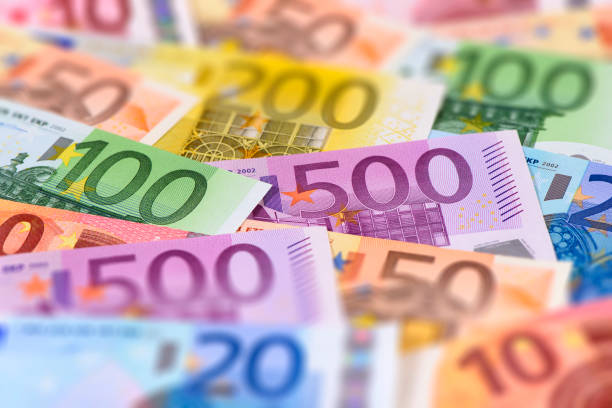 heap of many Euro currency banknotes stock photo