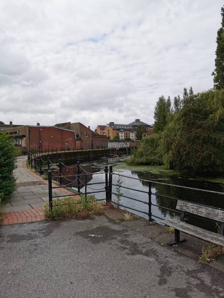 istock English river with iron bridge and willows 1165067907