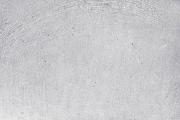 istock aluminium texture background, scratches on stainless steel. 1165069230