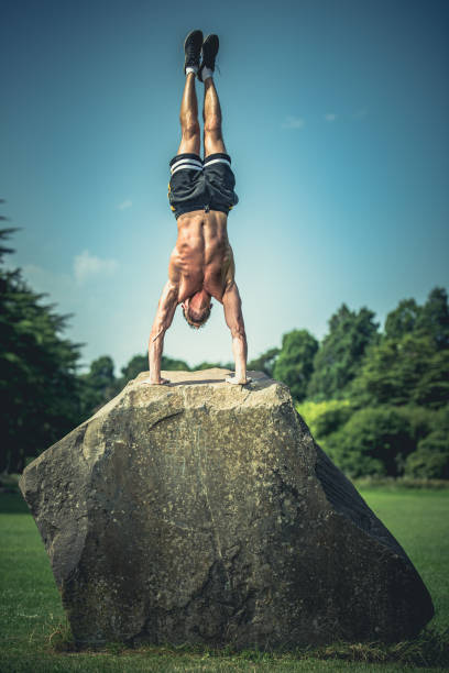 istock Fit man outdoor callisthenics workout 1165075234