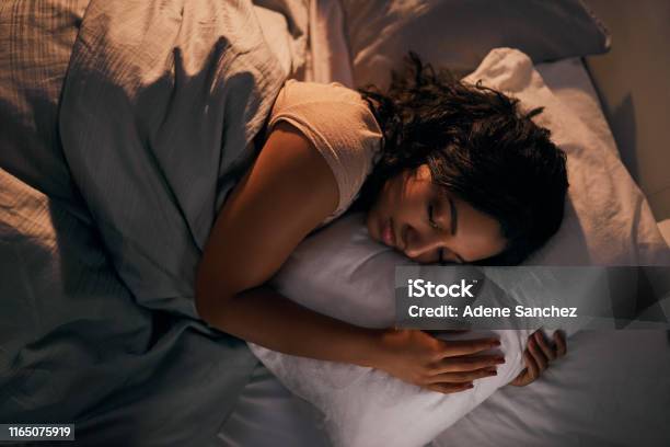 Still Stuck In Dream Land Stock Photo - Download Image Now - Sleeping, Women, One Woman Only