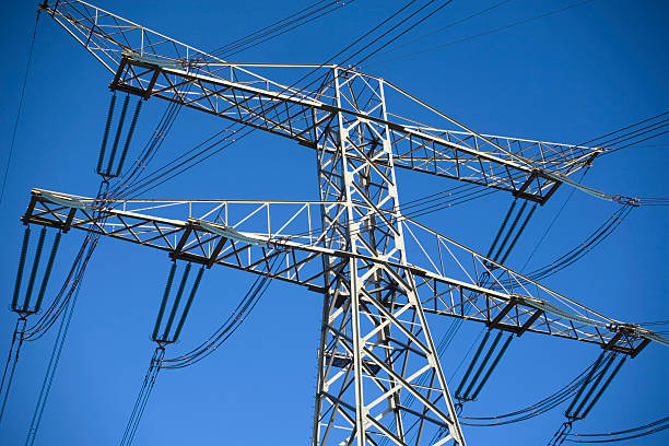 istock top of an electricity pylon against a blue sky 116507678