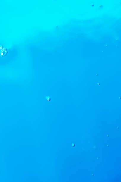 istock blur background light reflected in water with air bubbles and bokeh 1165078297