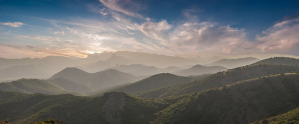 istock Mountains in clouds in summer day 1165078999