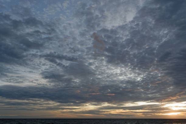 istock Sky​ and​ clouds​ over​ the​ sea​ in​ sunset​ 1165080120