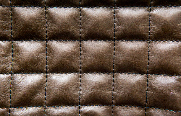 istock natural leather brown bag background 1165080859
