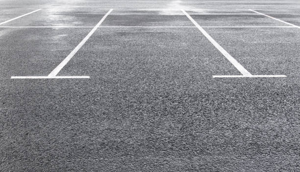 istock Marking lines of parking lot 1165083545