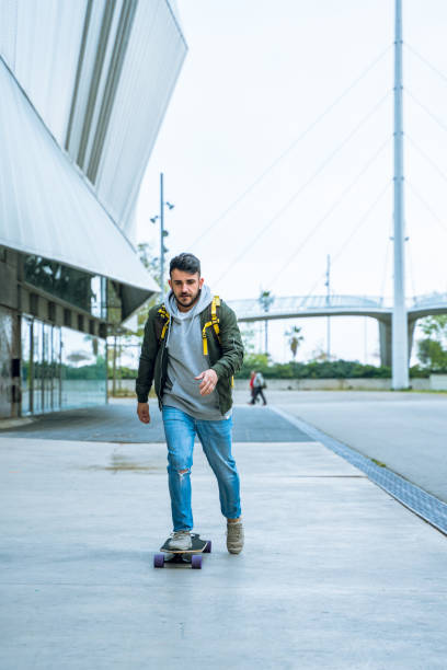istock Longboarding in Barcelona streets 1165085929