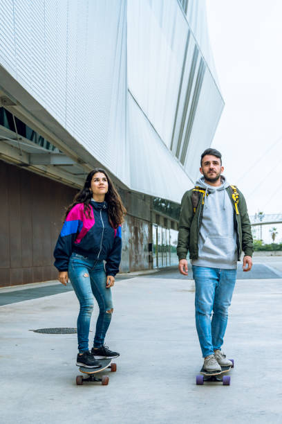 istock Longboarding together in Barcelona 1165085937