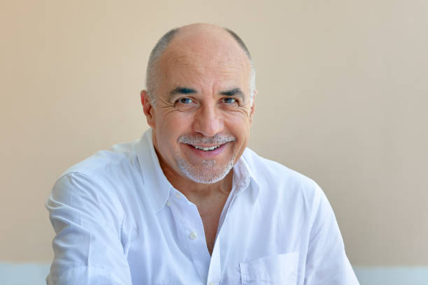 istock Portrait of a Smiling Senior Man 1165087132