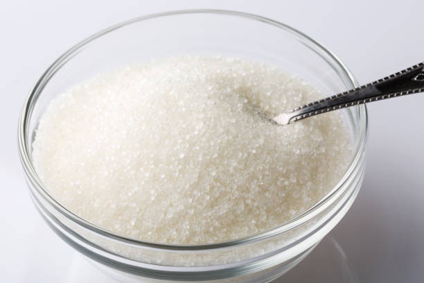 istock A glass bowl of sugar with spoon 1165095905
