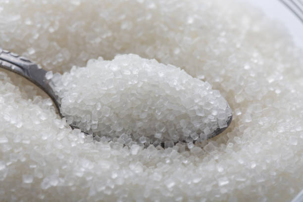 istock A glass bowl of sugar with spoon 1165096043