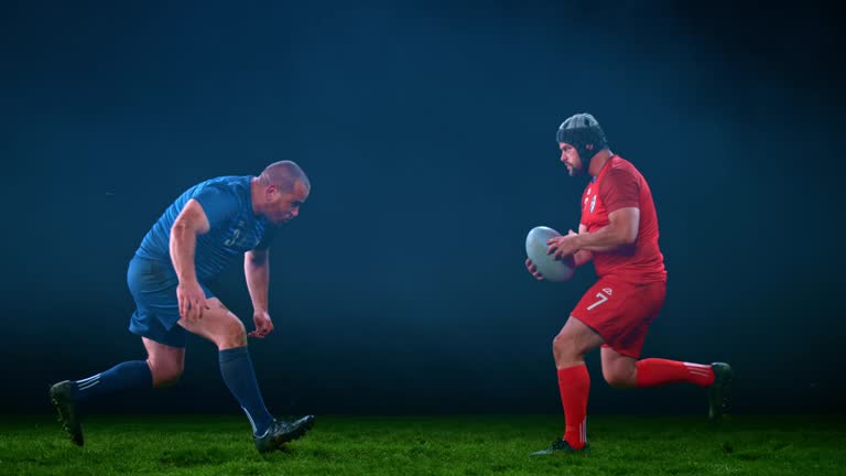 SLO MO LD SPEED RAMP Male rugby player tackling his opponent to the ground