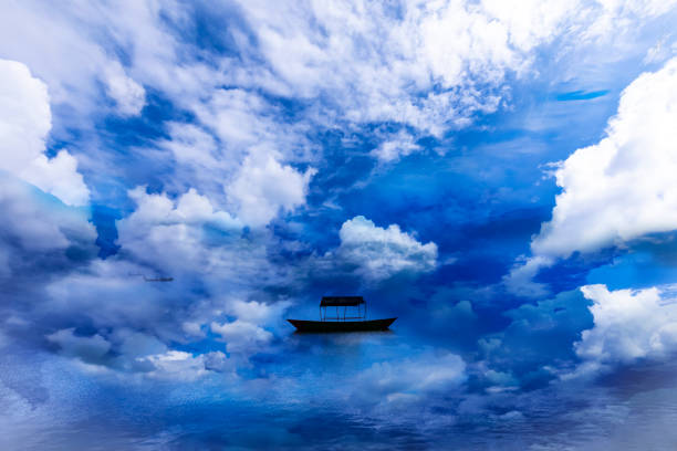 Beautiful Lake and single Boat with surround clouds.Phewa Lake Pokhara Nepal