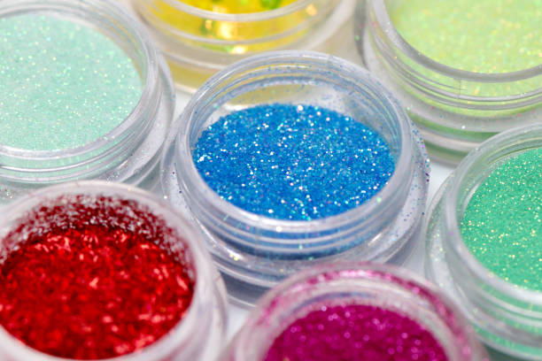 istock Shimmer and glitter in small plastic box, close up. 1165096269