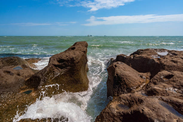 istock Rocky seashore and storm waves 1165096294