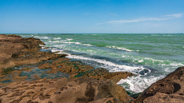 istock Rocky seashore and storm waves 1165096989
