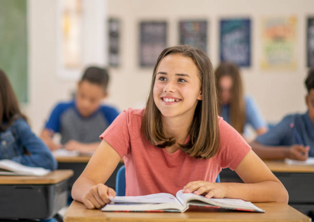 istock Young teenagers in the classroom. 1165100075