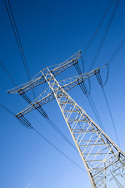 istock electricity pylons against a blue sky 116510144
