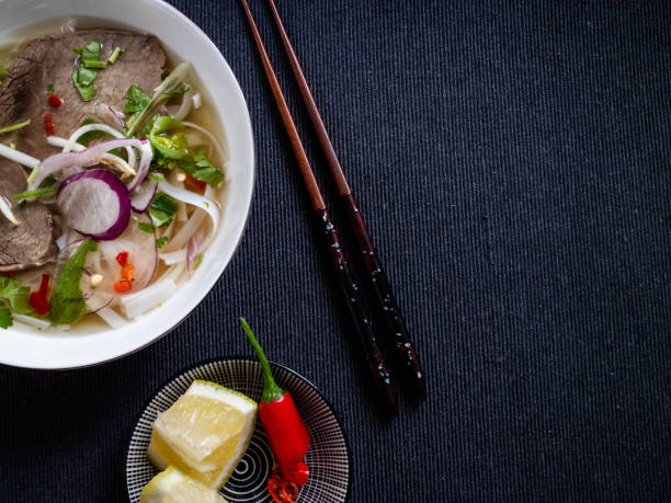 istock Vietnamese soup with lemon and peppers 1165106038