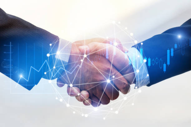 deal. business man shaking hands with effect global network link connection and graph chart of stock market graphic diagram, digital technology, internet communication, teamwork, partnership concept - financial occupation graph chart blue imagens e fotografias de stock