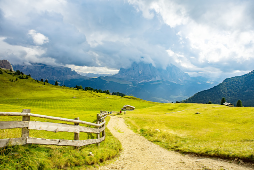 Summer landscape of Dolomites mountains with tourist road, Odle Puez, South Tirol, Dolomites mountains, Italy