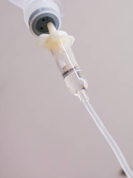 istock Saline solution drip for treatment patient in the hospital. 1165112326