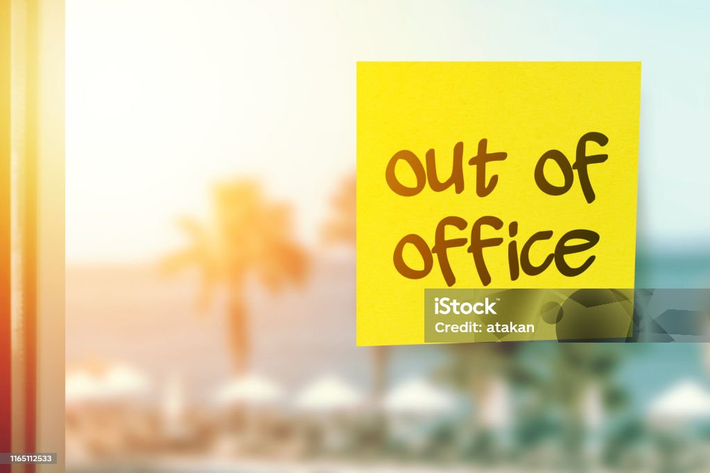 Taking a break from work Out of office concept Out of office sticky note paper on the hotel window vacation concept After Work Stock Photo