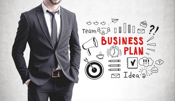istock Man with hands in pockets, business plan 1165113234