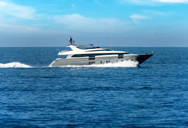 istock Luxury yacht in motion on the sea - Side view 1165114217