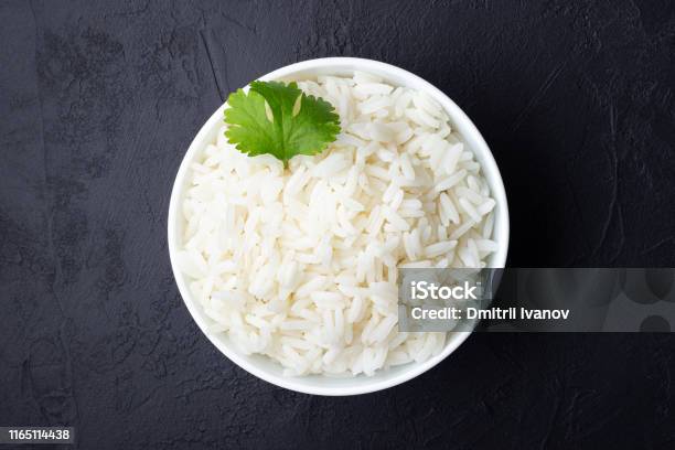 Boiled Rice In A Bowl Stock Photo - Download Image Now - Rice - Cereal Plant, Plate, Cooked
