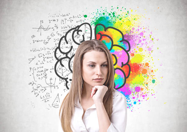 istock Pensive young woman, brain sketch 1165117700