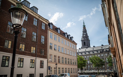 Quiet street in central Copenhagen opposite Christiansborg, the Danish Parliament.\nCopenhagen experienced three devastating fires - in 1728, in 1795 and in 1807 after the English bombardment. There are however still buildings left from the 15th century onwards.