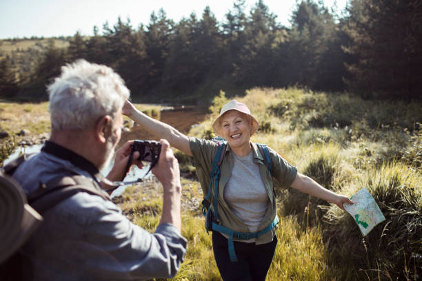 istock Senior Couple taking pictures 1165120249