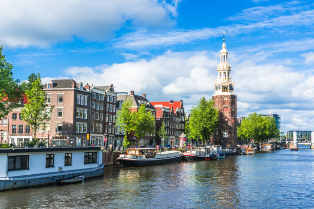 istock Amterdam canal, bridge and medieval houses 1165120308